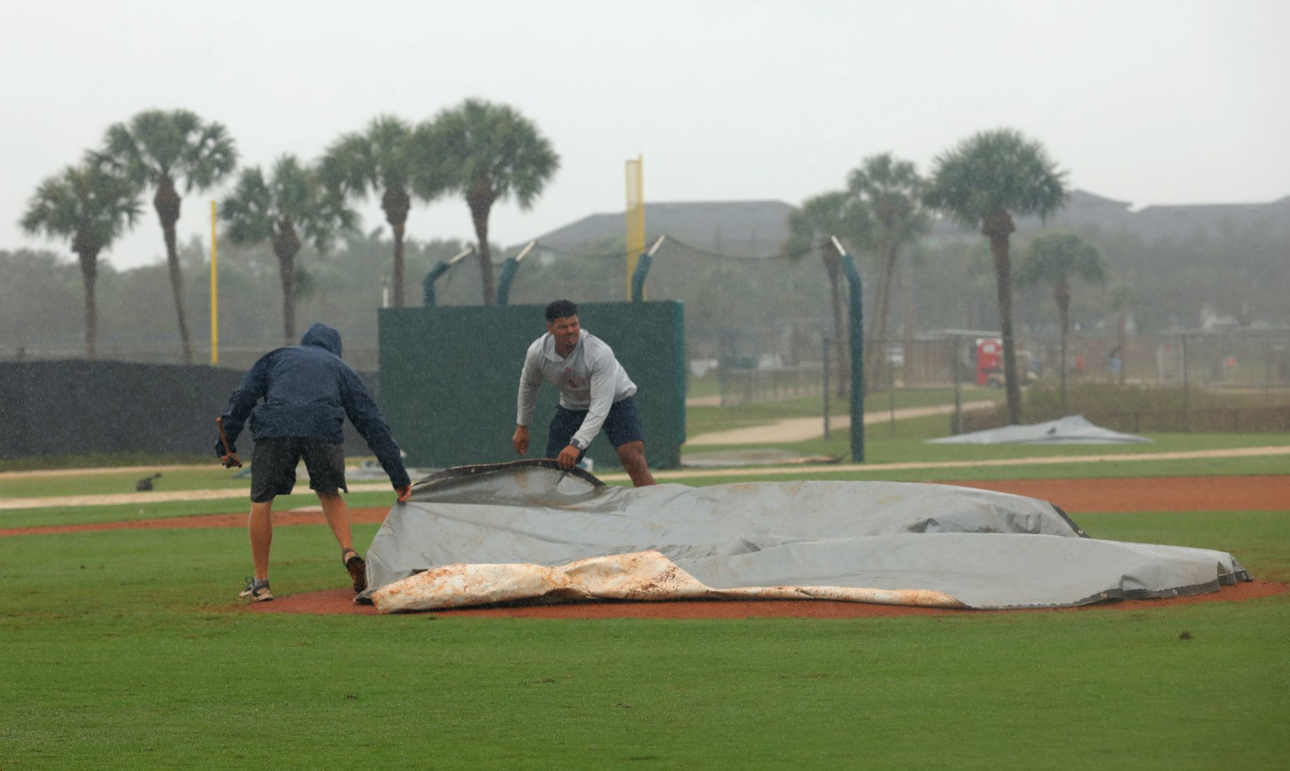 Rain shows during Saturday workout at Spring Training